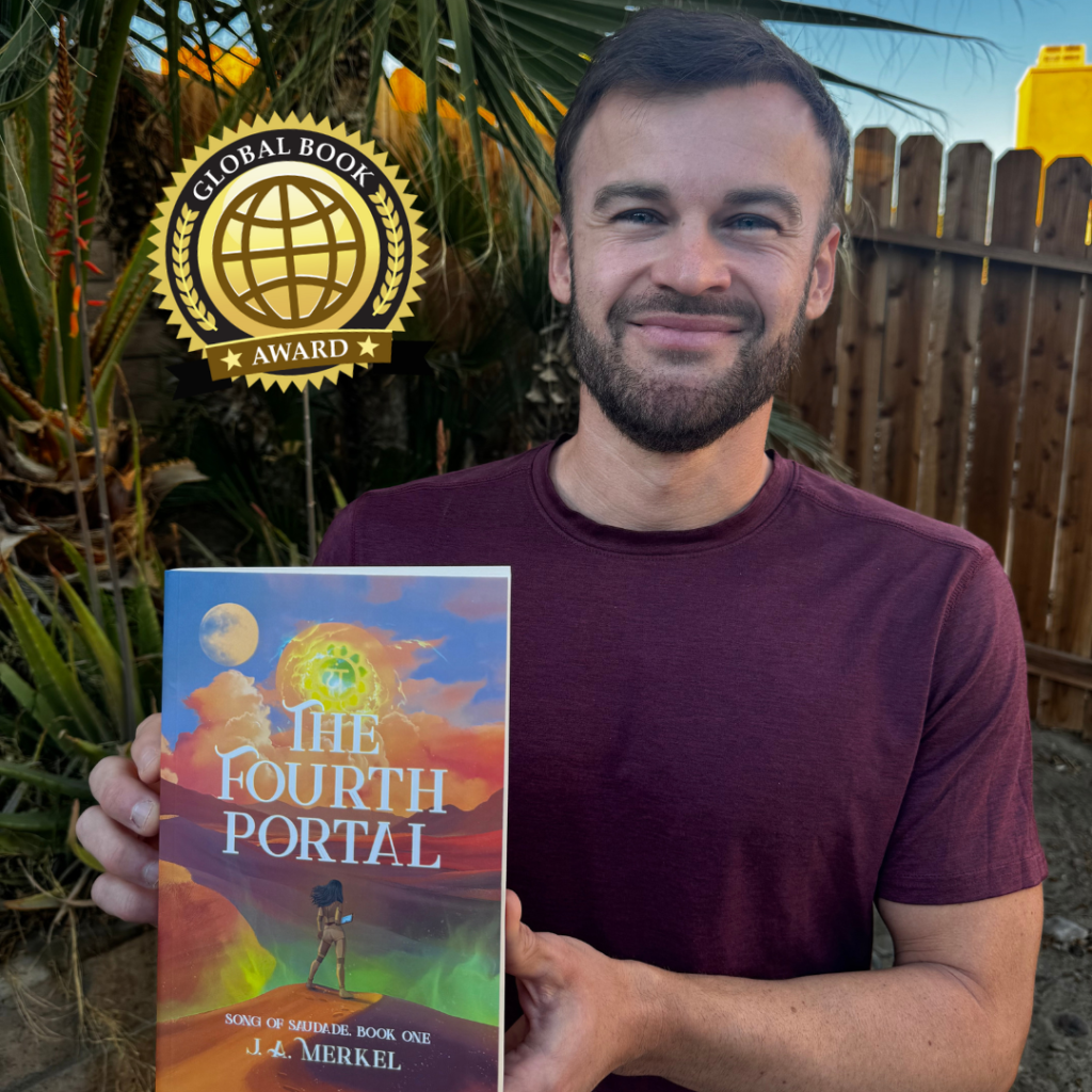 J. A. Merkel holds his award-winning novel, The Fourth Portal in his hands